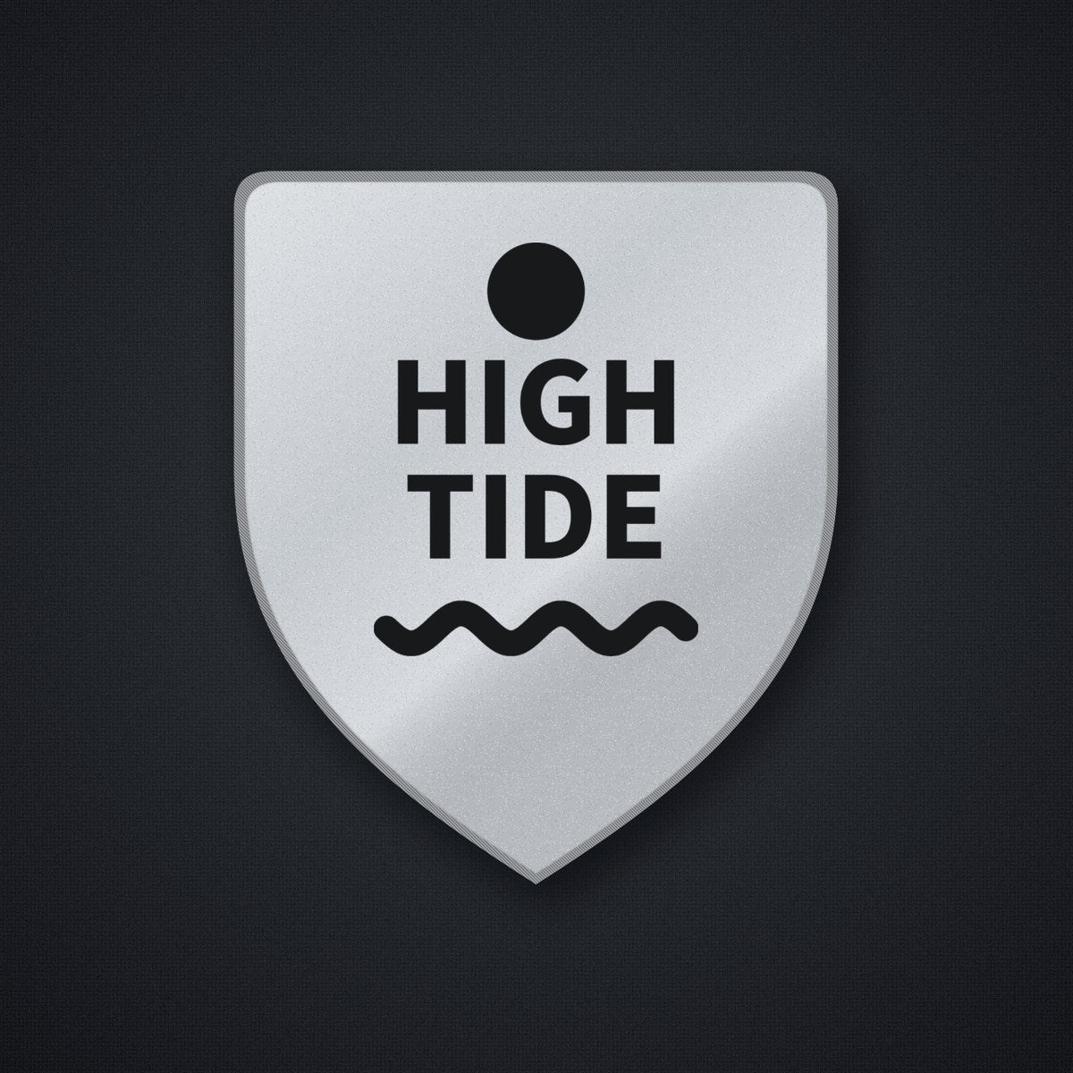 Example reflective patch: silver reflective shield patch with a black HIGH TIDE design